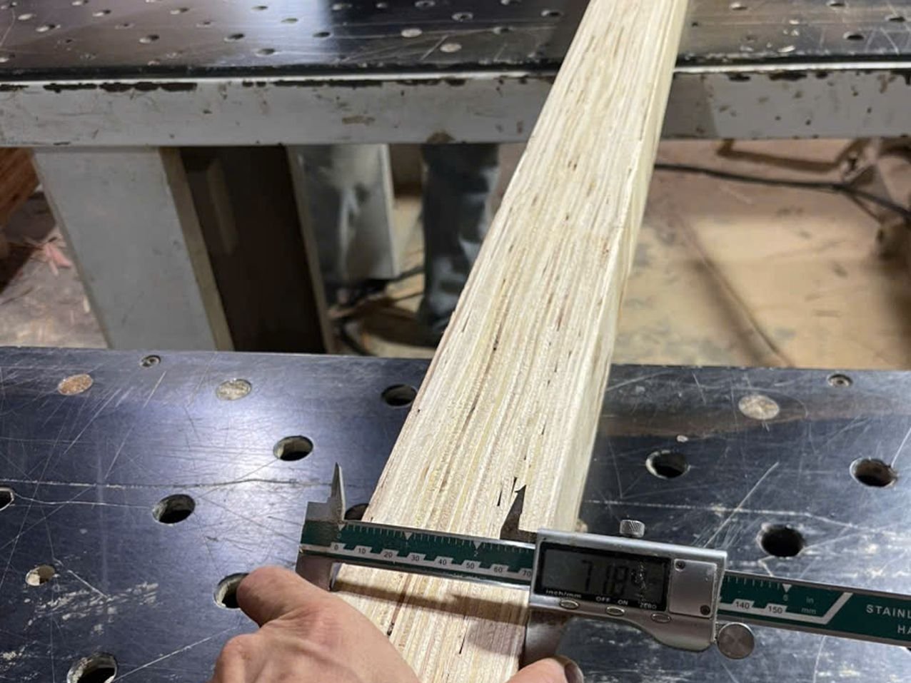 LVL slat width checked with a caliper